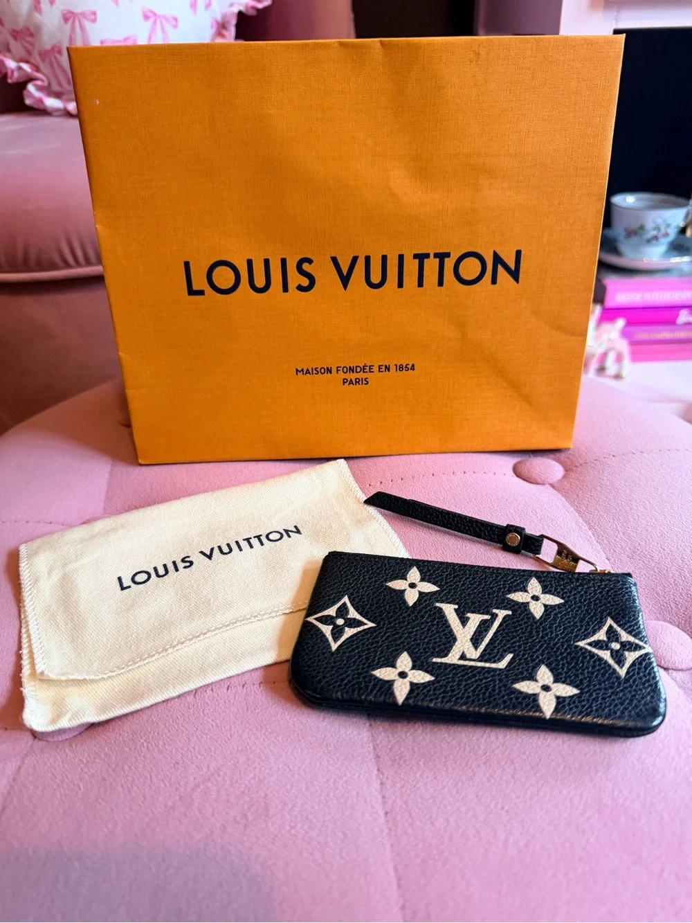 Louis Vuitton key pouch in bicolor black and cream